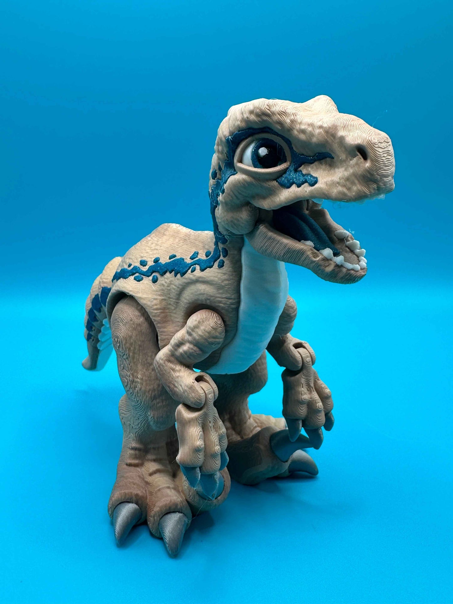 Articulated Velociraptor Dinosaur 3D Printed Toy | Stlflix | Blue | Raptor Gradient Tan