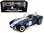 1965 Shelby Cobra 427 S/C Dark Blue Metallic with White Stripes with Printed Carroll Shelby's Signature on the Trunk 1/18 Diecast Model Car by Shelby Collectibles