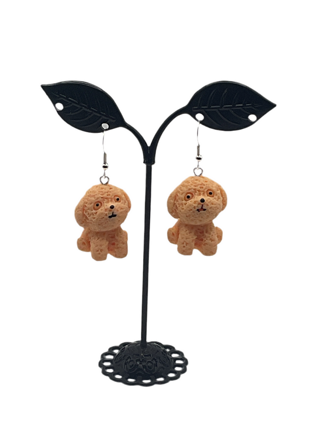 Fluffy dog earrings Hover Image