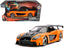 Han's Mazda RX-7 RHD (Right Hand Drive) Orange and Black "Fast & Furious" Movie 1/24 Diecast Model Car by Jada