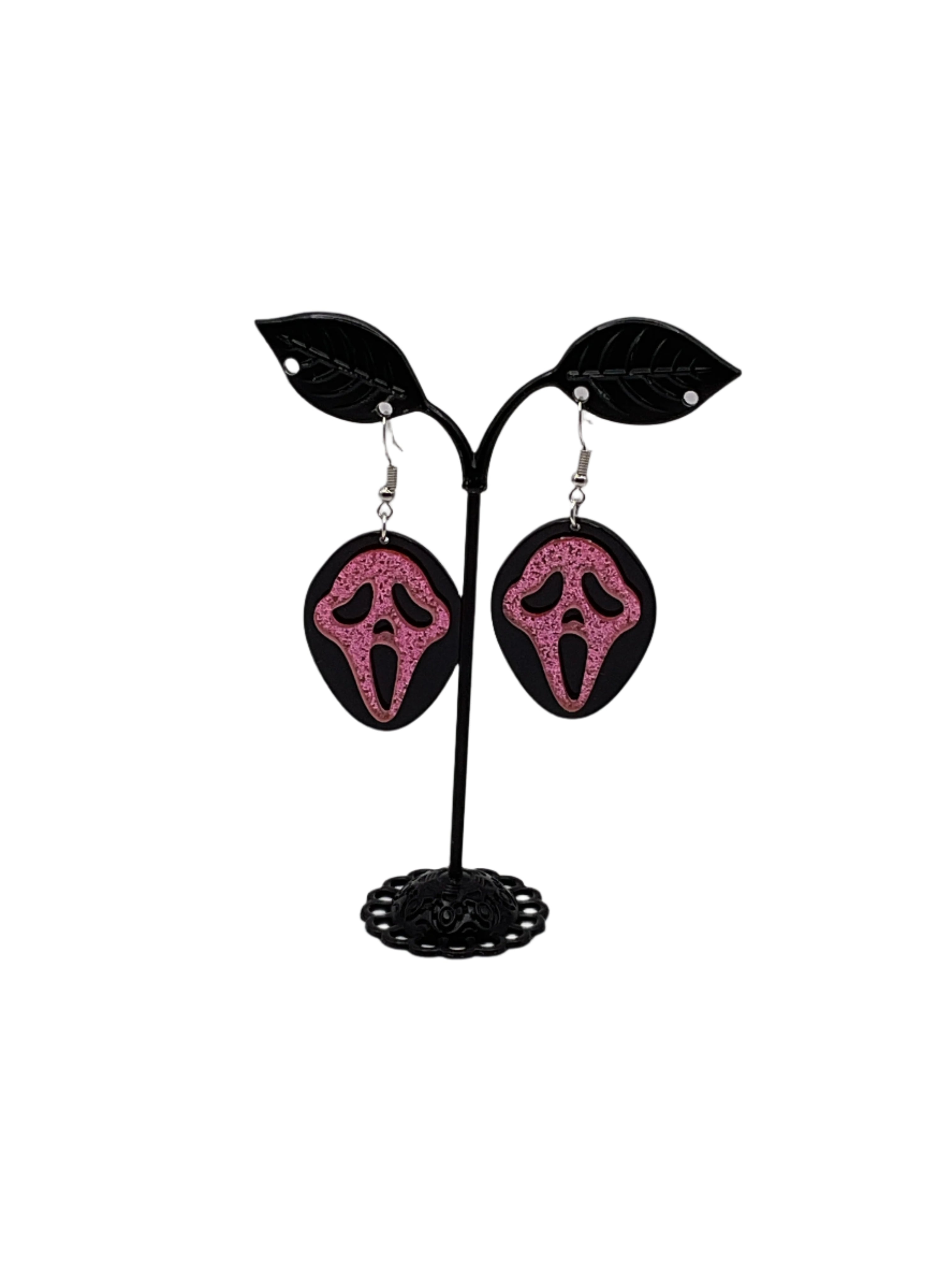 Pink and black scream earrings