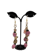 Pink ladybug and flower earrings