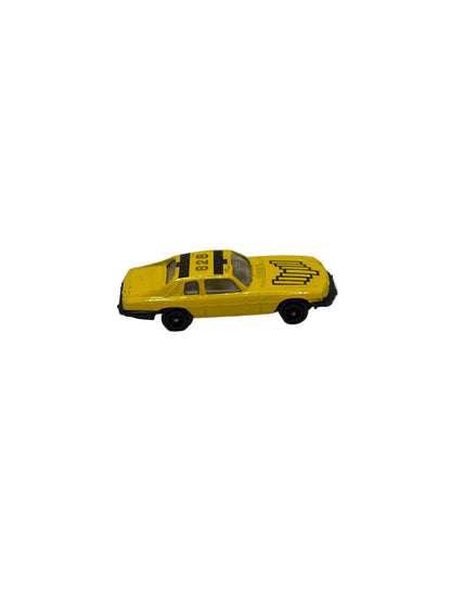 Crude Gingrell Jaguar XJS Diecast yellow