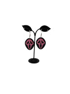Pink and black scream earrings