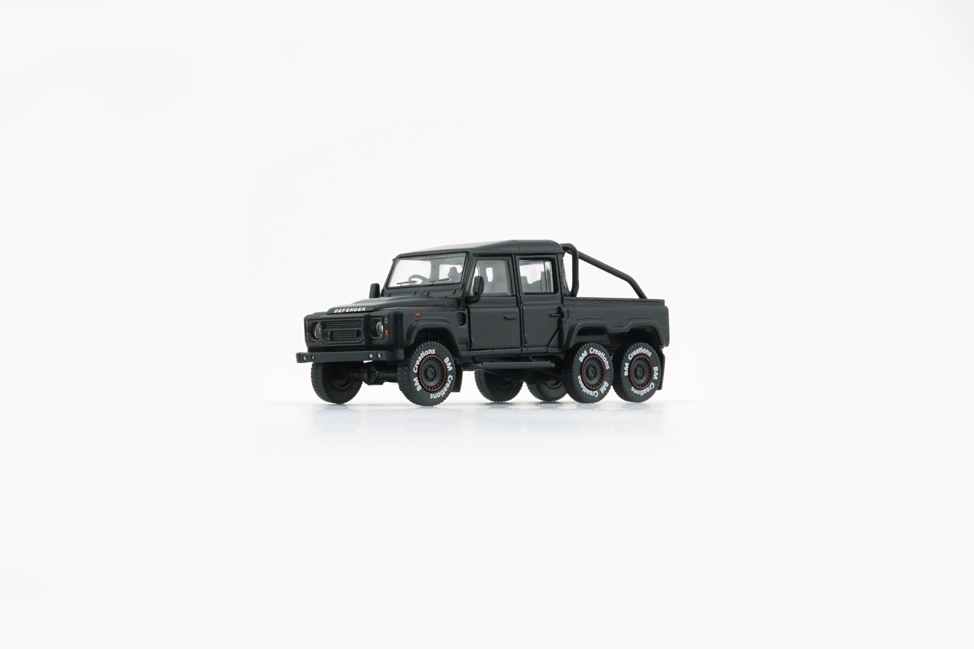 BM Creations 2016 Land Rover Defender 110 Pick Up 6x6 Off Road Matte Blk RHD 1:64 64B0339