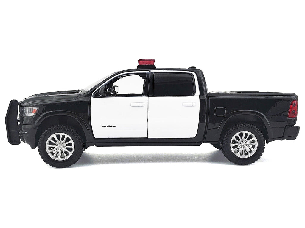 2019 RAM 1500 Laramie Crew Cab Pickup Truck Black and White with Flashing Light Bar and Front and Rear Lights and Sounds 1/27 Diecast Model Car by Motormax