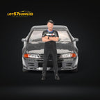 (Pre-Order) Mini-GT Nissan Skyline R32 Nismo Gunmetal With Matsuda Figure #869 1:64 MGT00869 - Collectors World Toys