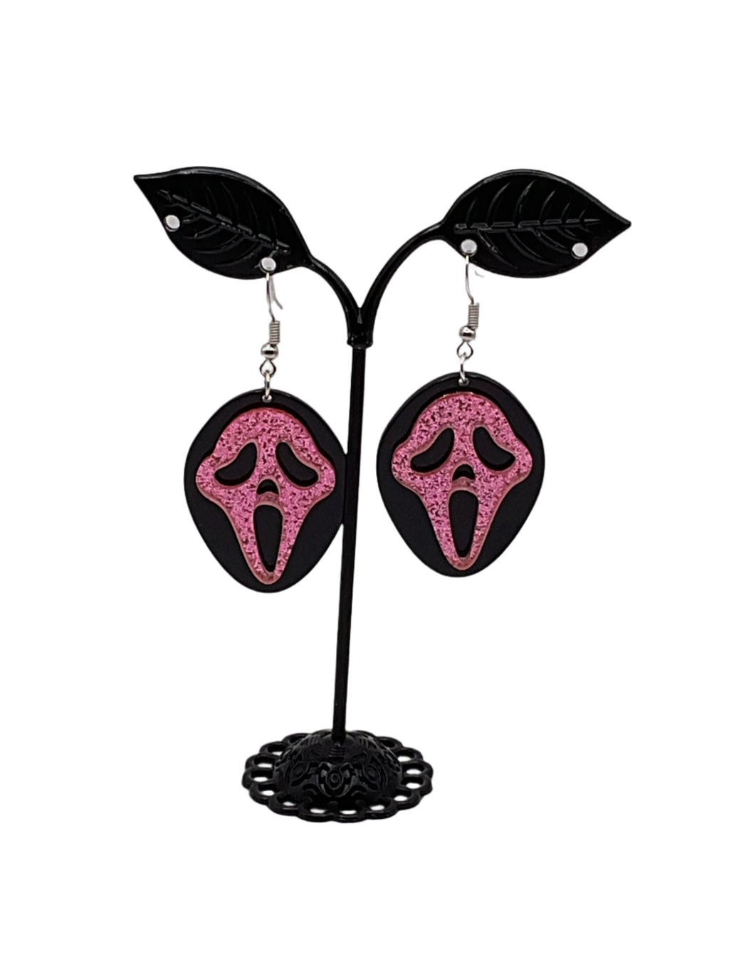 Pink and black scream earrings