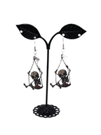 Skelton in a swing earrings