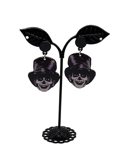 Top hat skull earrings