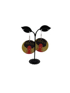 African woman round earrings