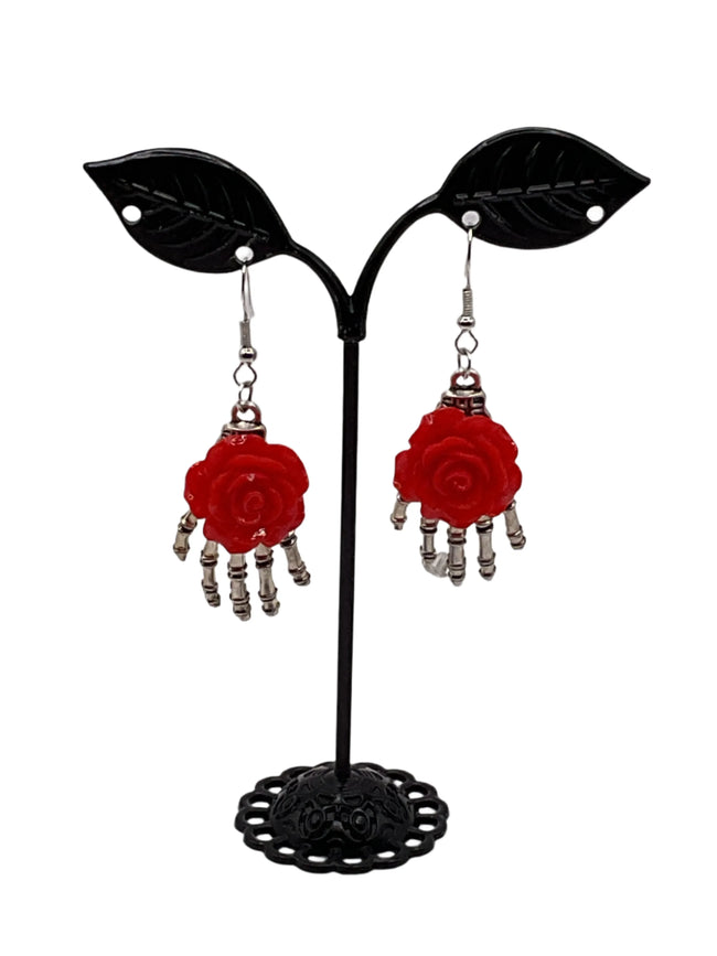 Skeleton Hand with Flower Earrings Hover Image
