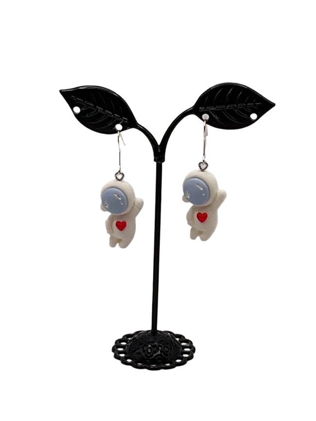 Waving Astronaut earrings Hover Image
