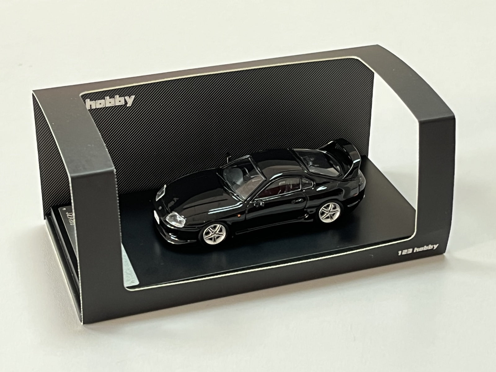 123 Hobby Toyota Supra JZA80Z in Black 1:64 - Collectors World Toys