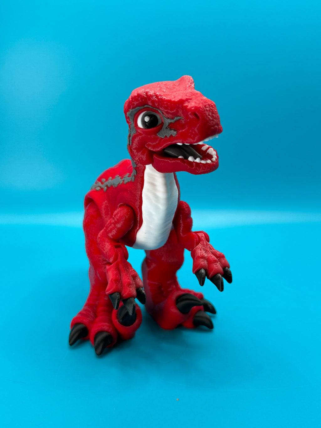 Articulated Velociraptor Dinosaur 3D Printed Toy | Stlflix | Blue | Raptor