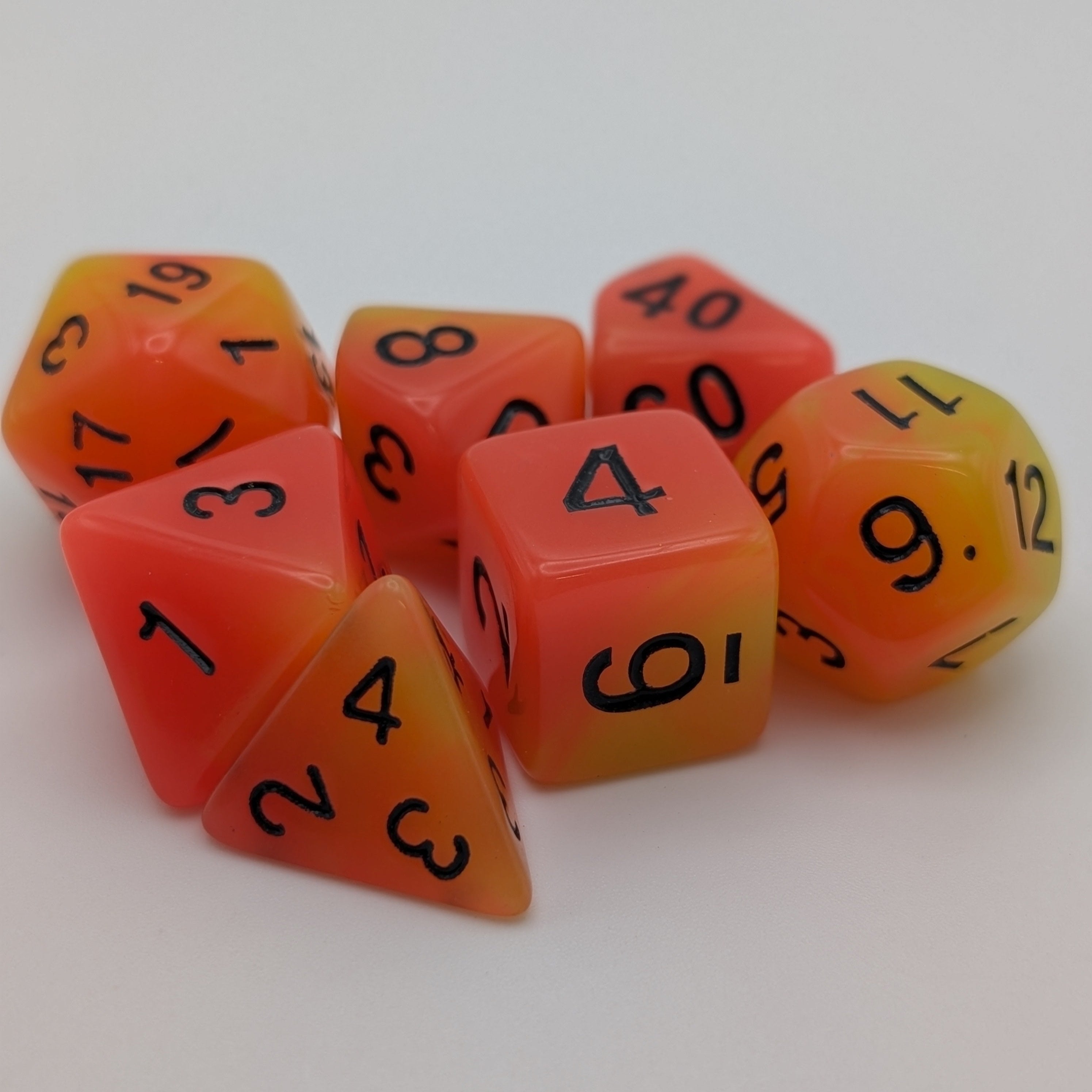 Orange and Yellow "Candlelight" - 7 Piece Glow in the Dark DnD Dice Set | Acrylic RPG Gaming Dice - Collectors World Toys