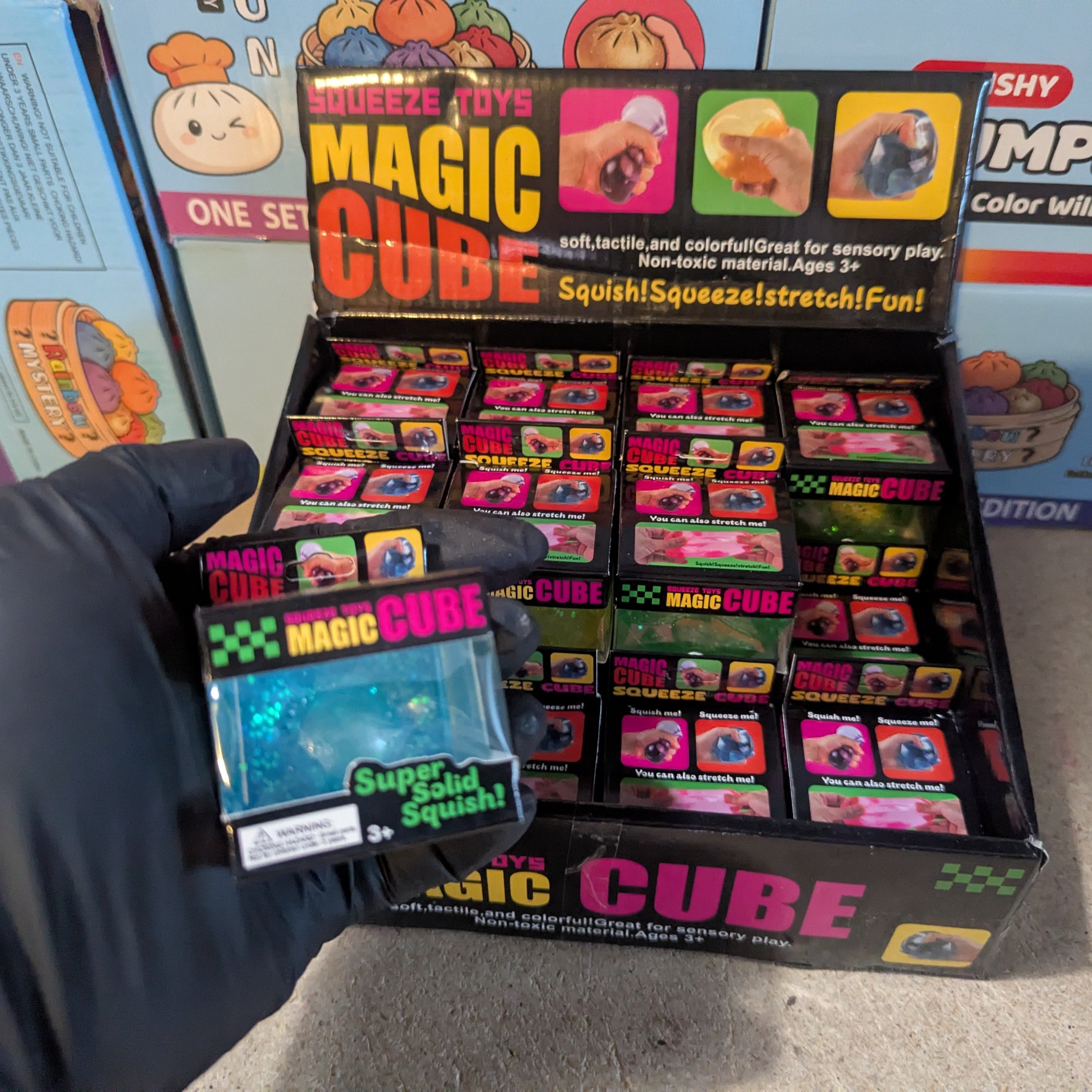 Blue Translucent Glitter Mini Magic Cube by Squeeze Toys (Slow-Rising Squish) Secondary image