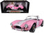1965 Shelby Cobra 427 S/C Pink with White Stripes with Printed Carroll Shelby Signature's on the Trunk 1/18 Diecast Model Car by Shelby Collectibles
