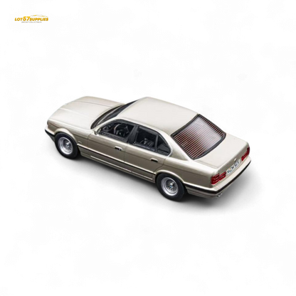 (Pre-Order) DCM BMW E34 5-Series Sedan - Cashmere Beagle Gold 1:64