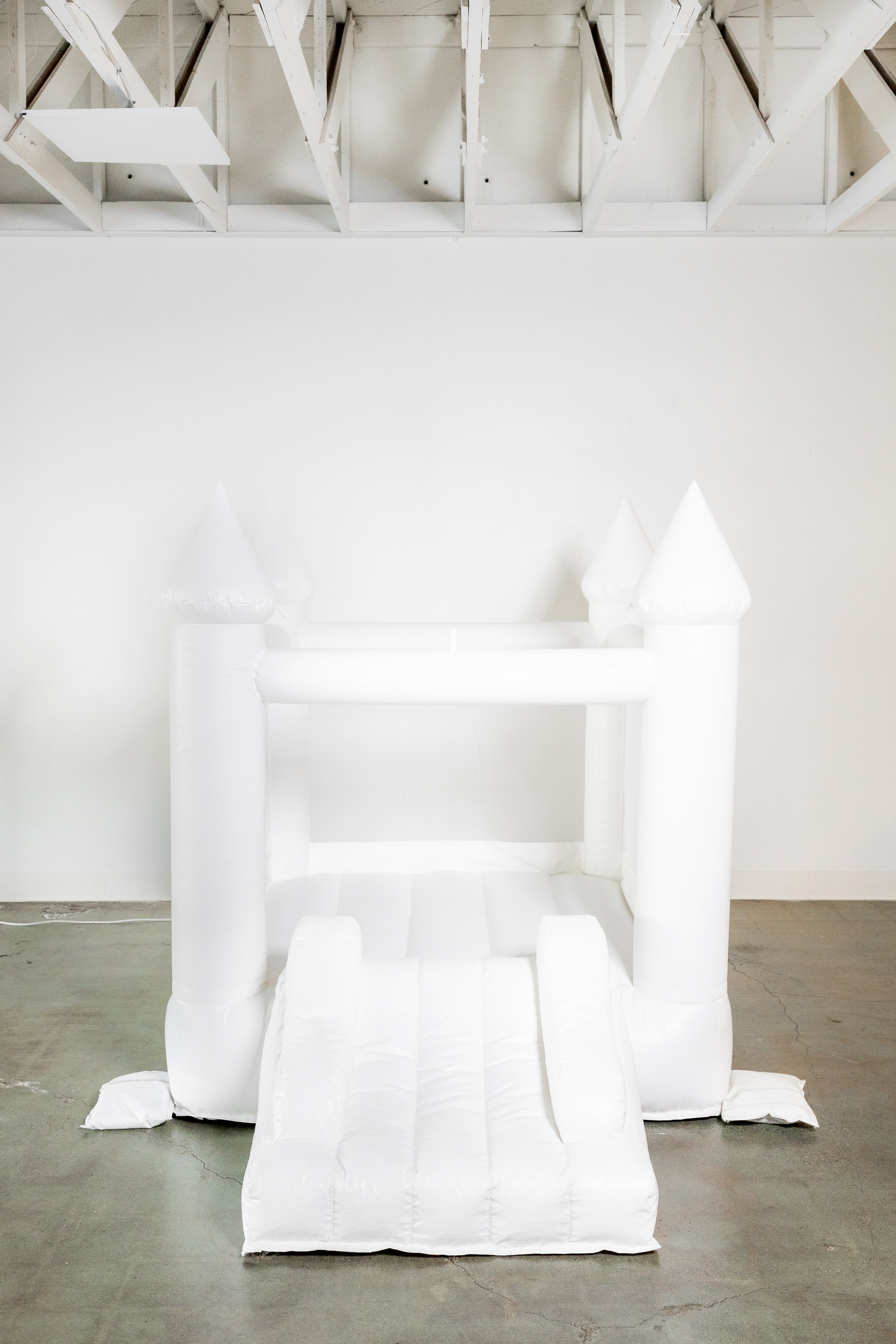 Mini Ava - White Bounce House with Cone Tops Main image