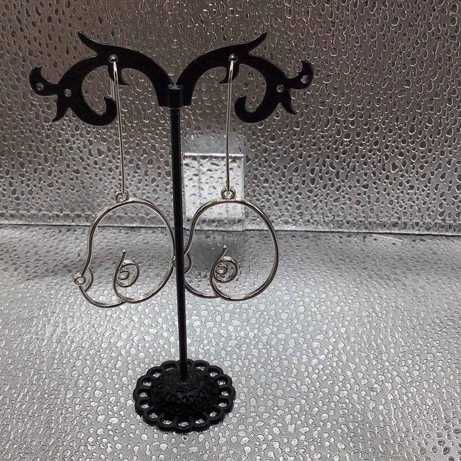 Silver Breast Earrings Hover Image