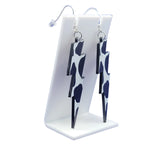 Cow print lightning bolt earrings
