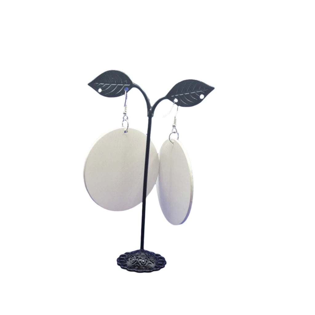 green and blue swirling pattern earrings