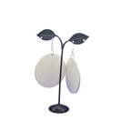 green and blue swirling pattern earrings