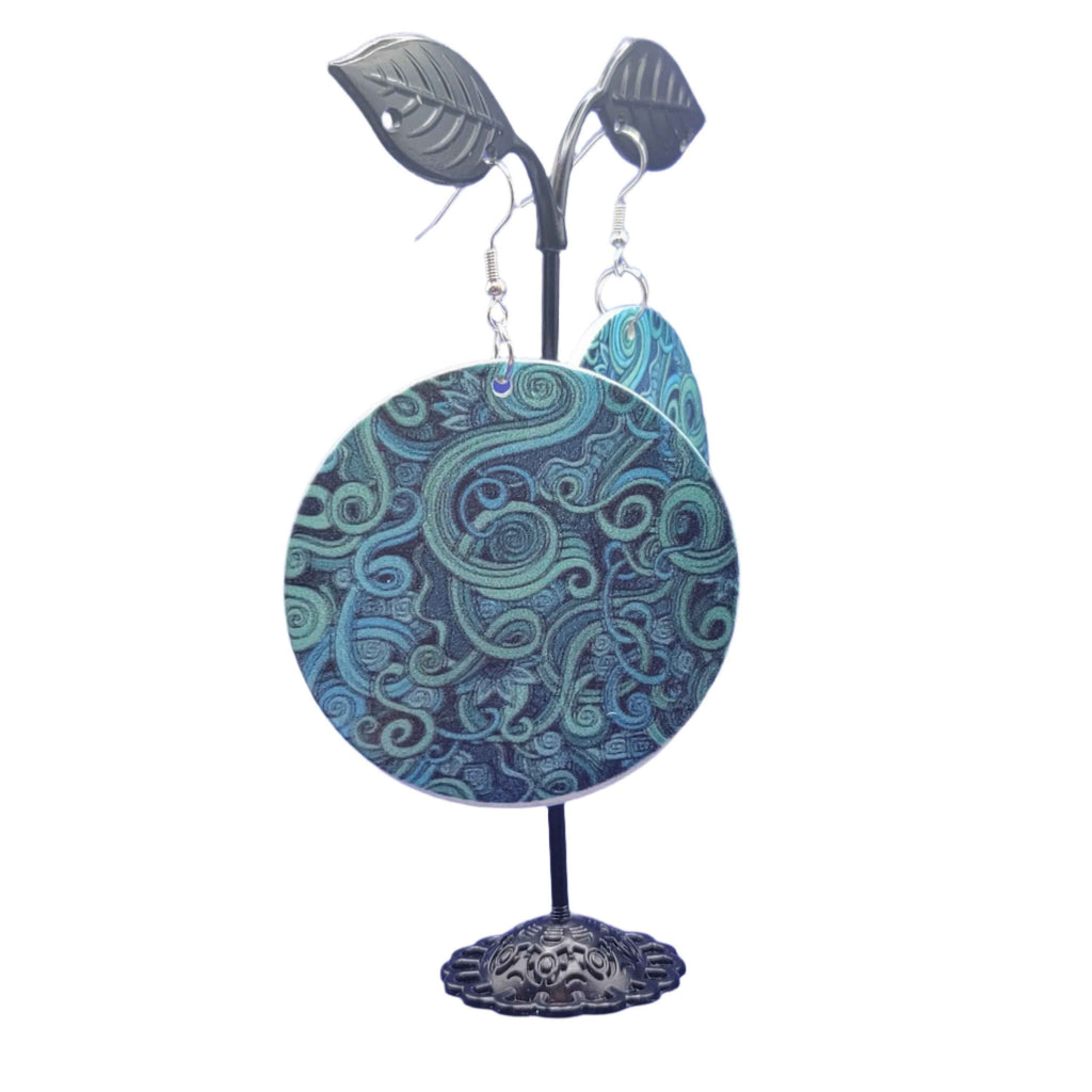 green and blue swirling pattern earrings