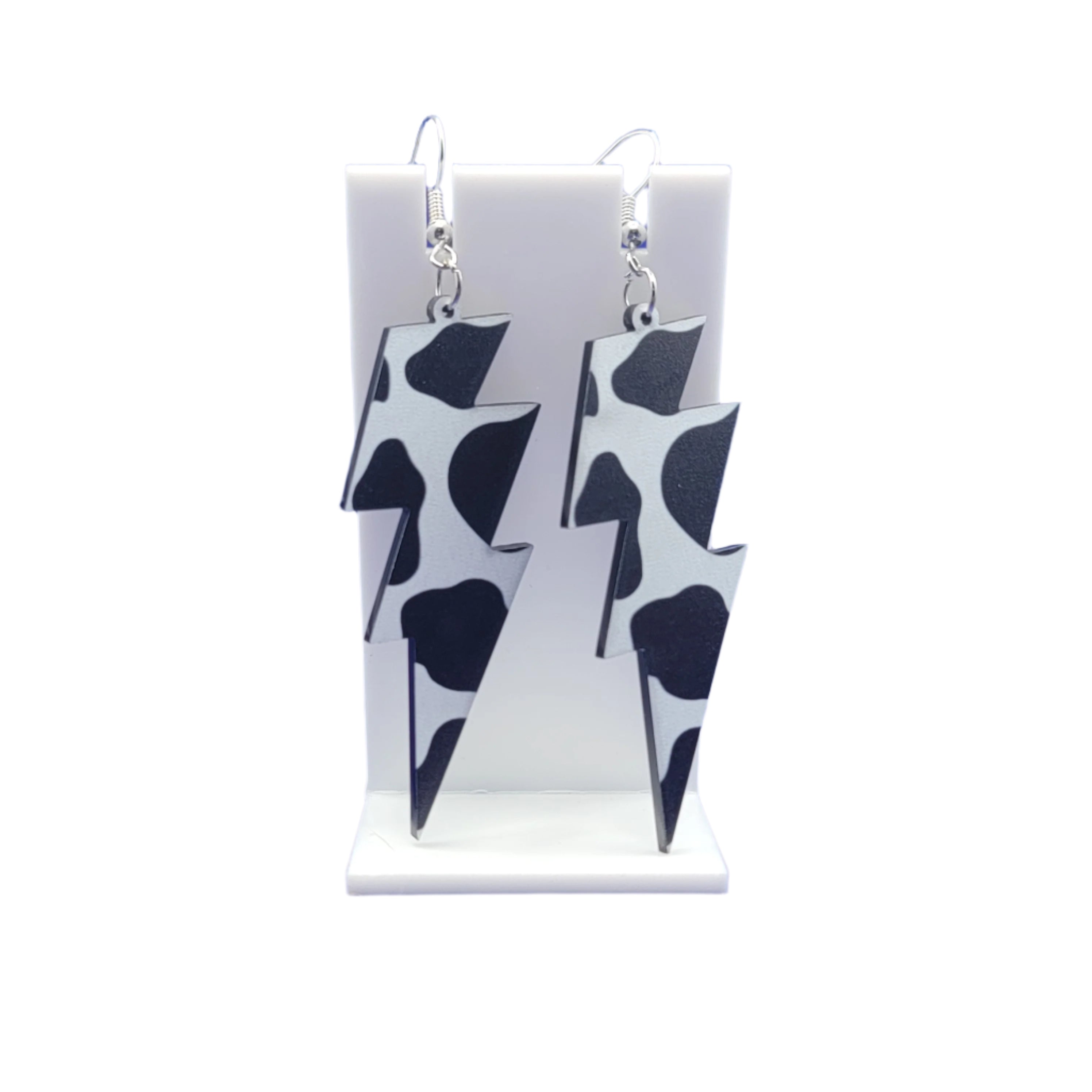 Cow print lightning bolt earrings Main image